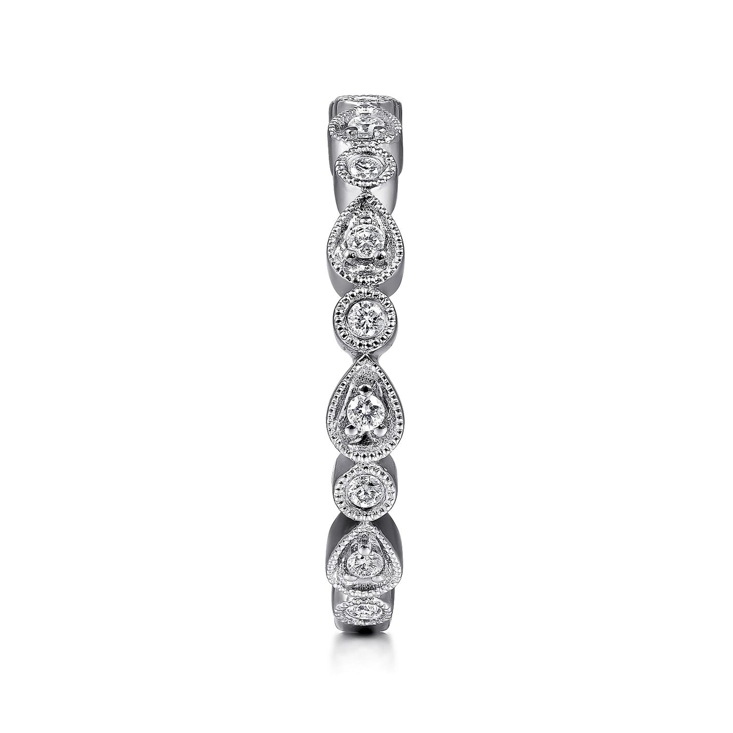 Pear and Round Diamond Station Ring