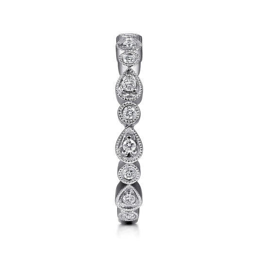 Pear and Round Diamond Station Ring